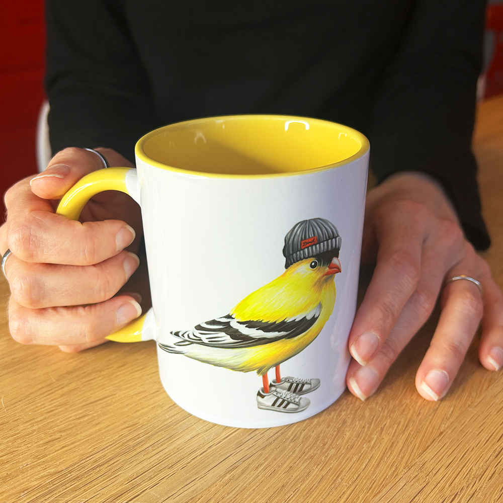 Goldfinch wearing shoes Mug