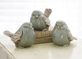 Assorted individual ceramic blue scroll bird